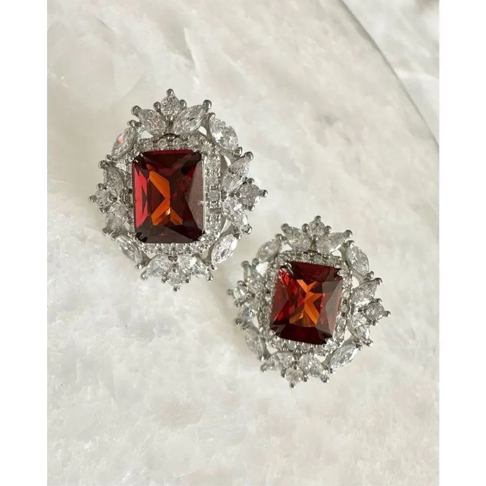 Ruby red cubic zirconia regal style stud earrings